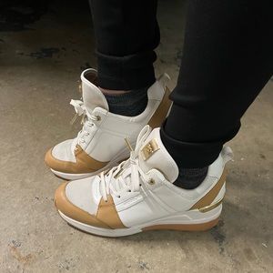 Michael Kors Georgie Mixed-Media Trainer Wedge Heel color block.